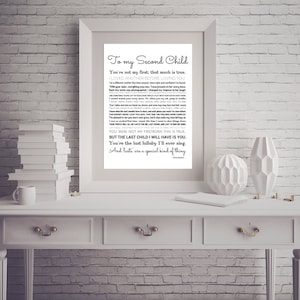 May include: A black and white printable wall art print with a poem titled "To my Second Child". The poem is a heartfelt message to a second child, expressing the love and joy they bring to the family.