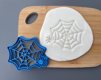 Spiders web with spider cookie cutter, Halloween, spooky, baking, decorating, party, trick or treat, cake