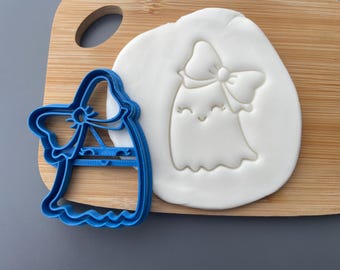 Ghost with bow cookie cutter, Halloween, spooky, cute baking, decorating, party, trick or treat, cake