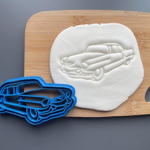 Cadillac cookie/ biscuit cutter, icing, cake, decoration, baking, dough, USA car, transport, classic car