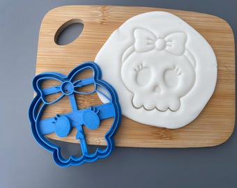 Skull with bow cookie cutter, Halloween, spooky, cute baking, decorating, party, trick or treat, cake