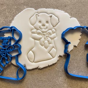 Puppy in a stocking cookie cutter, biscuit Cute dog, Animal icing decoration, pets, Christmas, winter, baking, cake decoration