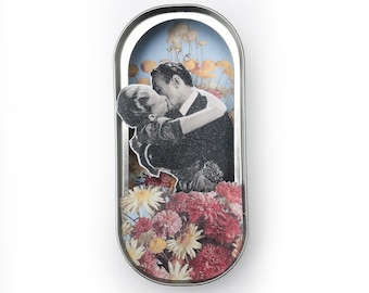 My collage artwork 'Love grows best in tiny houses' in a fish can