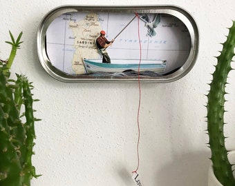 Mein Collage-Kunstwerk „Wahre Liebe, die heutzutage ein Wunder ist“ in einer Fischdose