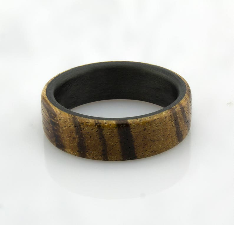 Carbon Fiber ring with Zebra wood.
