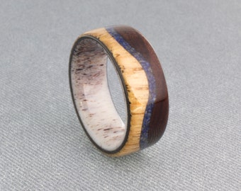 Wooden Ring oak and rosewood top and blue lapis lazuli wave through the middle