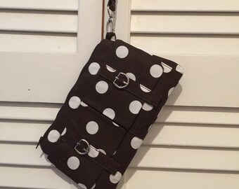 Brown polka dot clutch handbag