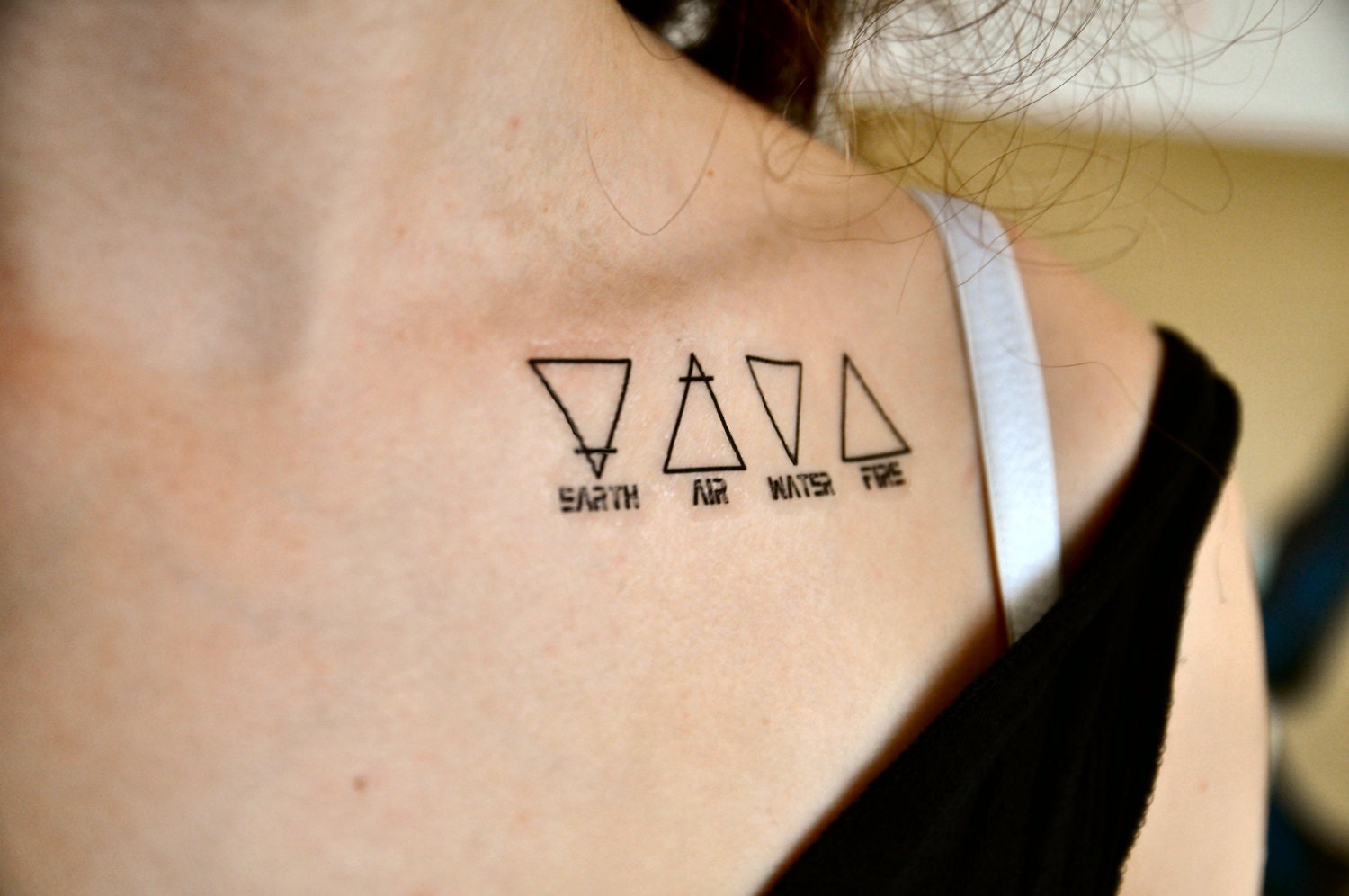 Elemente Feuer Wasser Luft Erde Tattoo
