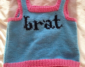 Knitted brat vest in pink and blue