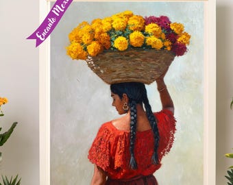 May include: Framed art print featuring a woman in a red dress carrying a basket of yellow and red flowers on her head. The artwork has a white frame and a purple banner that says "Encanto Mexicano". The painting is displayed on a light-colored surface.