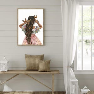 May include: A framed illustration of a woman with long brown hair decorated with butterflies and flowers. She is wearing a pink and white dress and is looking away from the viewer.