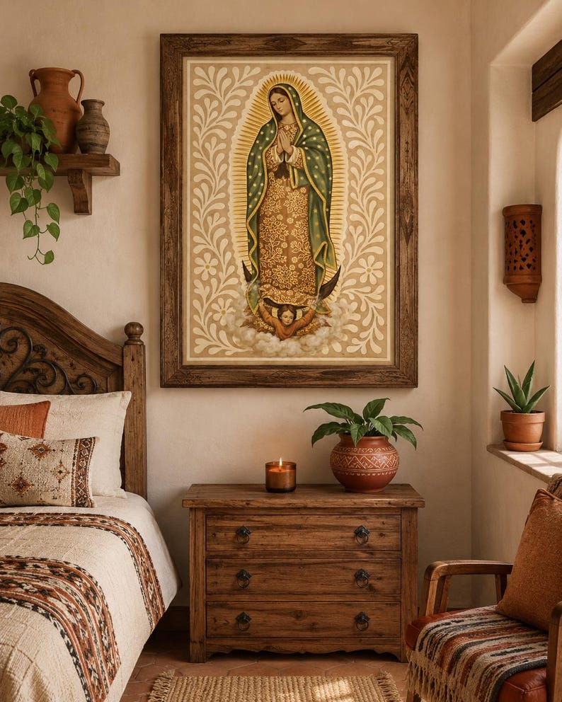 May include: A framed religious artwork depicting a figure in a green and gold robe, hands clasped in prayer, set against a cream-colored background with floral patterns. The artwork hangs above a wooden dresser in a bedroom setting.