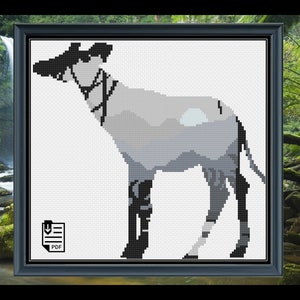 May include: Cross stitch pattern of a black and white Okapi with a mountain landscape silhouette inside the animal's body. The pattern is in a black frame with a PDF download icon.