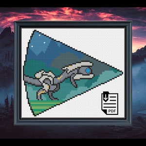 May include: Cross stitch pattern featuring a pixelated image of a spaceship flying over a green and blue landscape with stars in the sky. The pattern is in a triangle shape and includes the text "PDF" at the bottom.