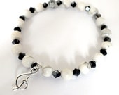 Howlite and Black Swarovski Crystal with Treble Clef Charm (Medium - 6.5")