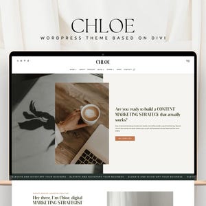 May include: A digital display of the Chloe WordPress theme based on Divi, featuring a website layout with a navigation menu, a hero section with a coffee cup and laptop image, and text asking about content marketing strategy and services.
