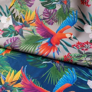 May include: A tropical fabric with a repeating pattern of colorful parrots, palm leaves, and flowers. The fabric is beige with a blue and green pattern on the bottom.