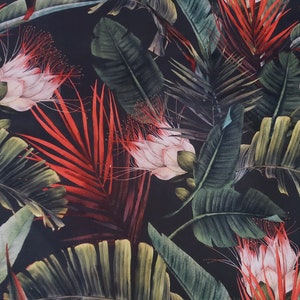 May include: A black background with a tropical print featuring large green leaves and pink and red flowers.