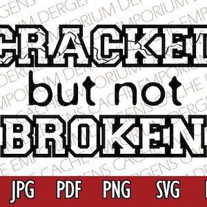 May include: Black and white graphic design with the text "Cracked but not broken". The text is in a bold, blocky font.