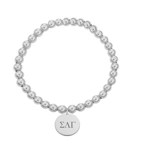 May include: A silver beaded bracelet with a silver charm that says "ΣΛΓ".