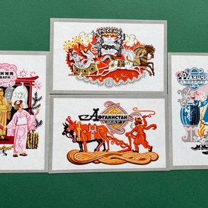 Bonne année ! Les fêtes de fin d'année dans le monde. Illustrateur : Y. Smolnikov. Lot de 12 cartes postales soviétiques vintage, 1970
