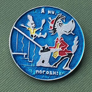 ZELDZAME Wolf, Hare Nu Pogodi-speld. Vintage Sovjetspeld, badge, Made in USSR