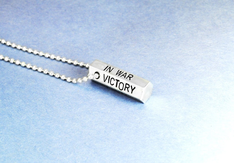 Aluminum Hexagon Necklace: 'In War, Victory. In Peace, Vigilance. In Death, Sacrifice' Dragon Age Inspired, Hand Stamped 3/8' Bar 