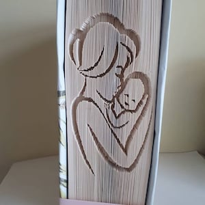 Madre y bebé cortan y doblan patrón de plegado de libros, Día de la Madre, Nuevo bebé, Embarazo, Recién nacido