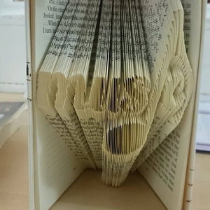 Book folding pattern for "music" with quaver as i" +free tutorial