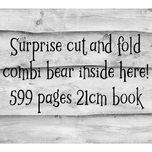 Book folding pattern for a bear holding a heart. Cut and Fold Combi style 599 pages