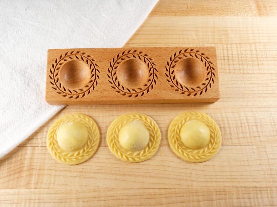 Raviolis à la courge et huile à l'origan - Recette