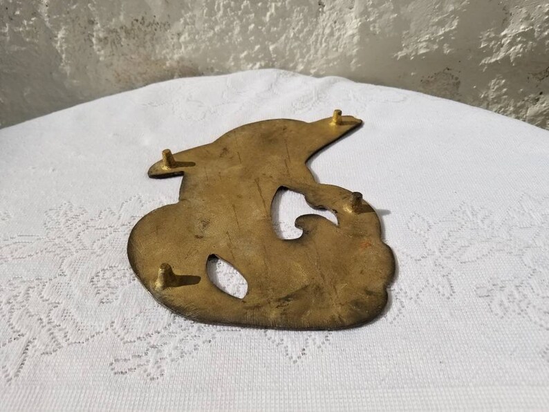 Jumping Dolphin in Water Ocean Waves Porpoising Brass Dolphin Trivet 4 prong feet Vintage Hot Plate
