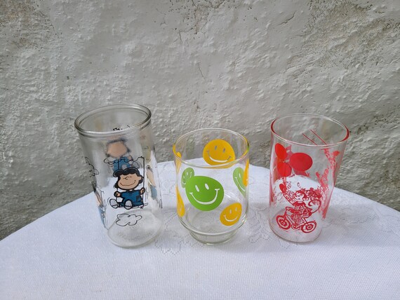 CHOICE of Vintage Glass Tumblers, Smiley Face, Red Circus Clown Swanky Swigs, Peanuts Lucy United Features Syndicate