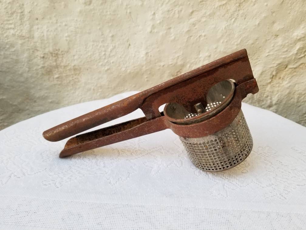 Rustic country kitchen ricer. Vintage kitchen Universal potato masher