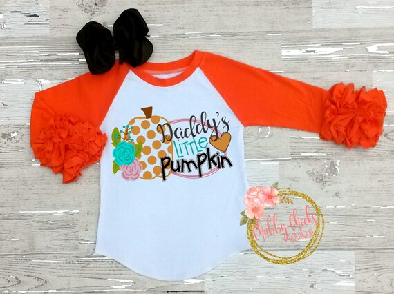 orange ruffle shirt