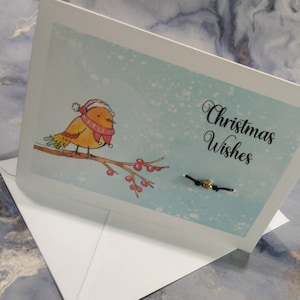 Weihnachtskarte mit Weihnachtskehlchen. Grußkarte mit Wunscharmband, Frohe Weihnachten, Frohe Weihnachten