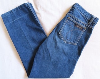 1980s Calvin Klein Jeans Medium Blue Wash High Waisted Pleated Straight Leg Cropped Denim size 29" waist / 37" hip / 11" rise / 27.5" inseam