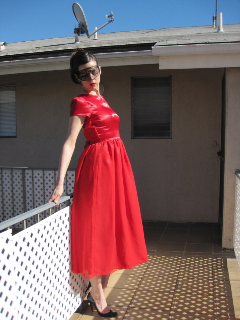 super eight ruffle gown hire