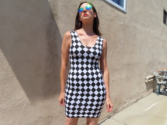 black and white check mini dress Zara Trafaluc Black and White Plaid V-Neck Mini Dress – SilkRoll main image 1