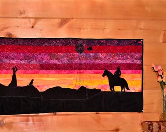 The Cowboy and His Lady/ 43 3/4 X 21 3/4/ Western romance silhouette art quilt/ Fiery sunset/ black silhouettes old fashioned/ windmill/ dog