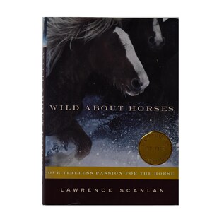 May include: A book cover with a dark image of horses. The title "WILD ABOUT HORSES" is in white letters. Below the title is a gold seal. The author's name, Lawrence Scanlan, is at the bottom.