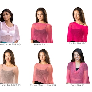 May include: A collection of six sheer, lightweight knit ponchos in various shades of pink, labeled as Ballerina Powder Pink #43, Rose Pink #27, Fuschia Pink #70, Conch Shell Blush Pink #51, Cherry Blossom Pink #118, and Coral Pink #8.