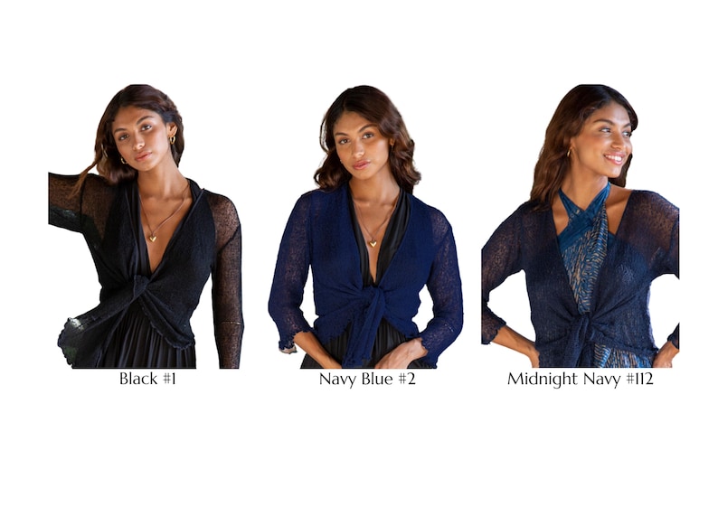May include: Three cropped shrugs with long sleeves and a front-tie closure. The first is black labeled Black #1, the second is navy blue labeled Navy Blue #2, and the third is a dark midnight blue labeled Midnight Navy #112, all in a knit fabric.