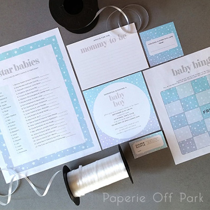 May include: A set of baby shower party games and decorations with a blue and white star pattern. The games include a baby bingo card, a star babies game, and a mommy to be advice card. The decorations include a baby shower invitation with the text "Samantha is having a baby boy".