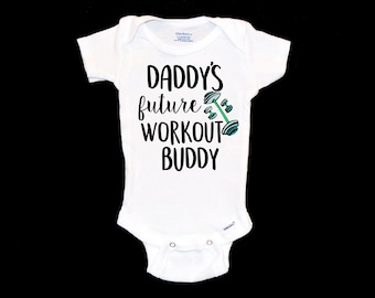 Daddy's Future Workout Buddy Onesie®®. Dad. My Father is a Gymrat. Gym Lover. Gym Rat. Pregnancy Announcement. Weight Lifter. Work Out.