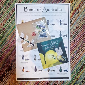 May include: A Bees of Australia educational poster featuring various bee illustrations, a brown envelope with a red wax seal, a clear plastic bag containing bee stickers, and a book titled Barbara's BIG Adventure with a yellow flower and bee.