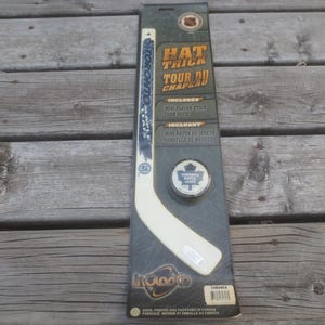 Brand New Vintage Sealed Aglasco NHL Toronto Maple Leafs Mini Stick Official Licensed NHL Hologram Sticker and Foam Puck.  **FREE Shipping**