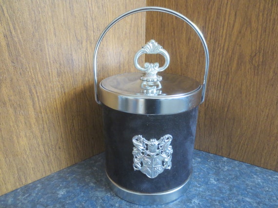 Vintage Mid Century Modern Playboy Funk Chic Black Velvet Wrapped Coat of Arm Shield Emblem Design Ice Bucket.