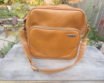 Rara borsa da viaggio e tempo libero Samsonite Scandia in vinile, vintage, moderna, nuova di zecca, mai usata, con tracolla regolabile.