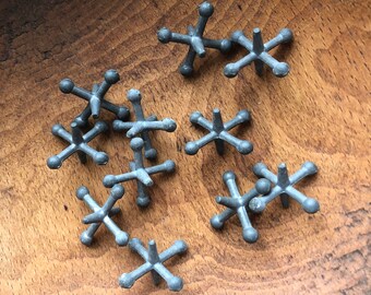 old fashioned metal jacks and ball